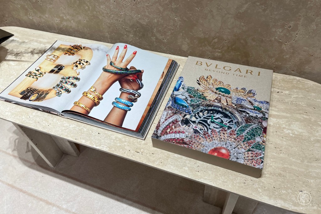 Beyond Time — the Bvlgari Beyond Time book open on a travertine table