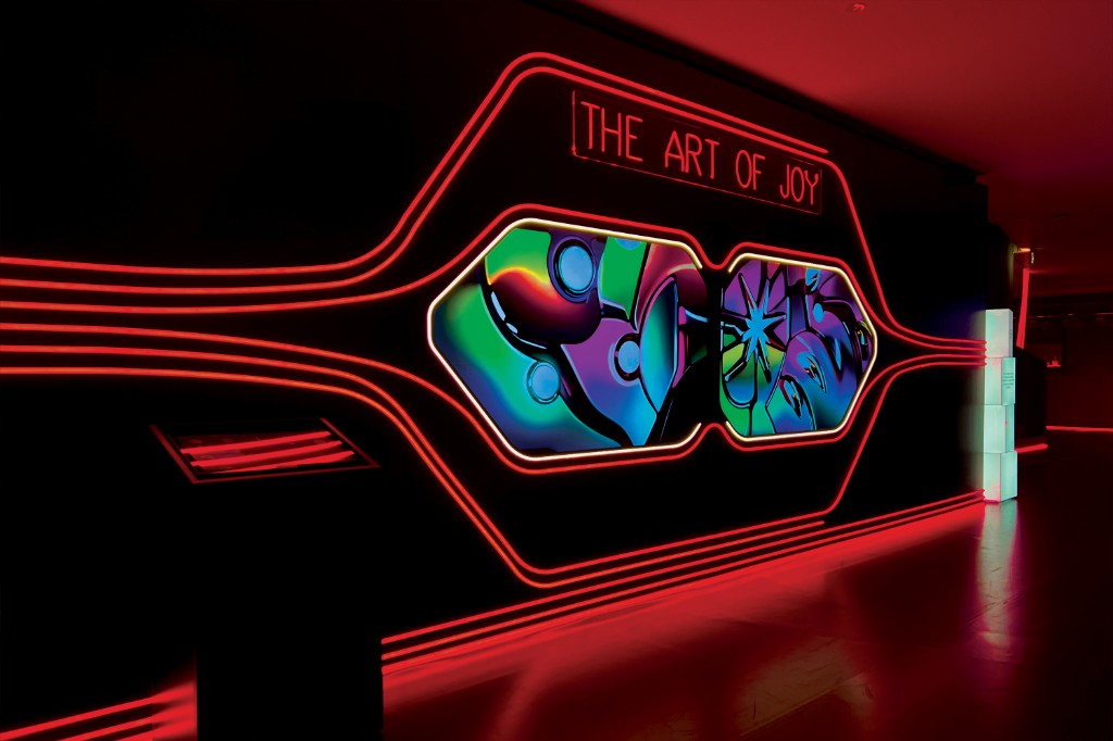 Make it Real for BMW in Milan — The Art of Joy neon wall with AI-generated illustrations